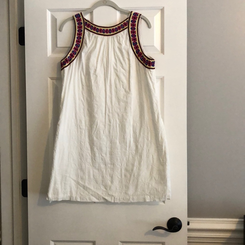 Adorable detail on white summer dress!